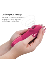 WOMANIZER - STIMOLATORE CLITORIDEO ROSA VIBRANTE